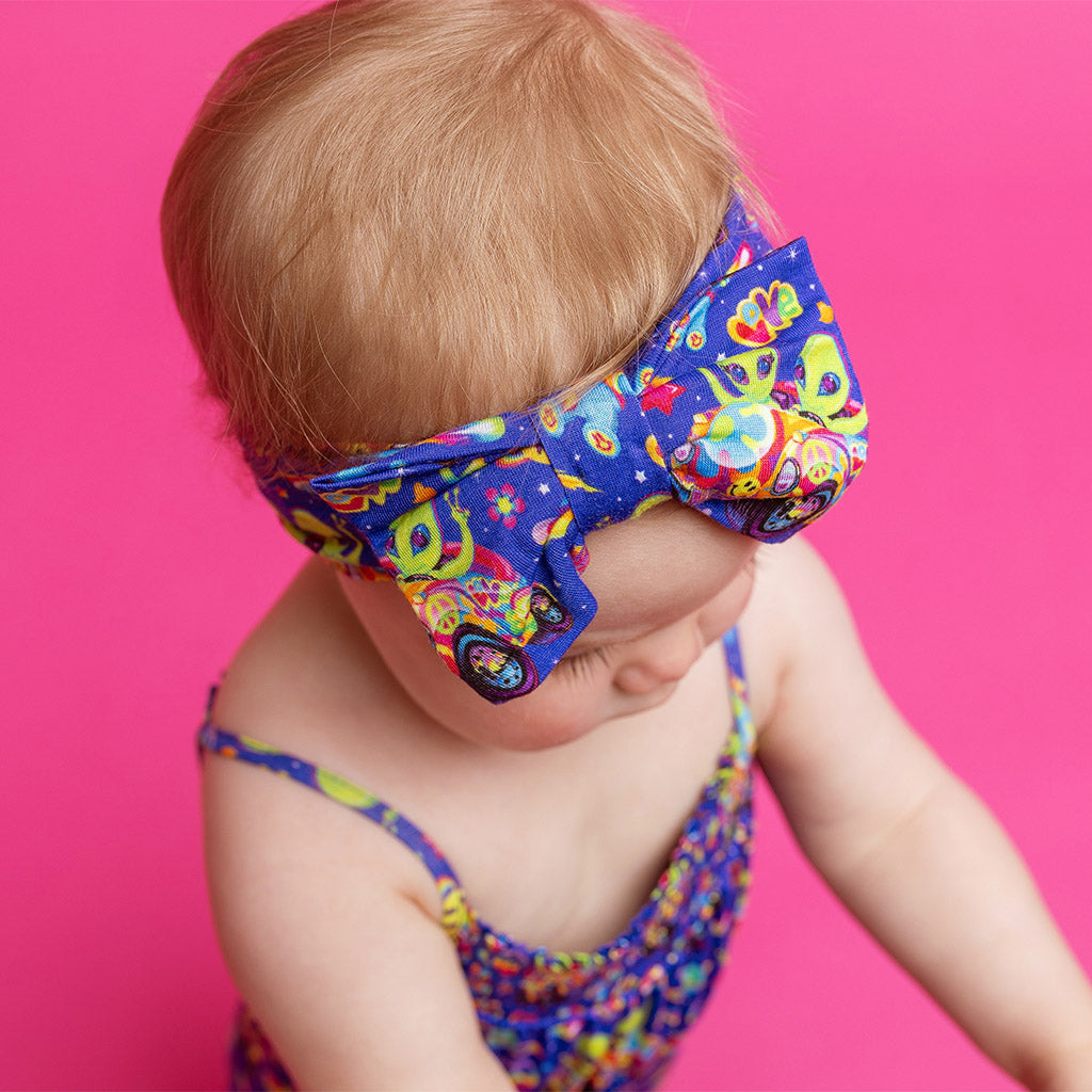Lisa Frank® Zoomer & Zorbit Luxe Bow Headwrap