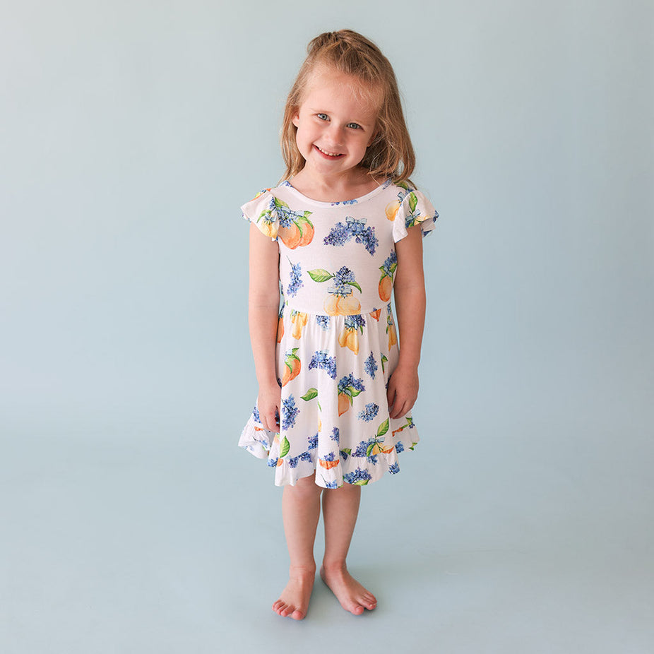 Sorrento Tie Back Ruffled Twirl Dress