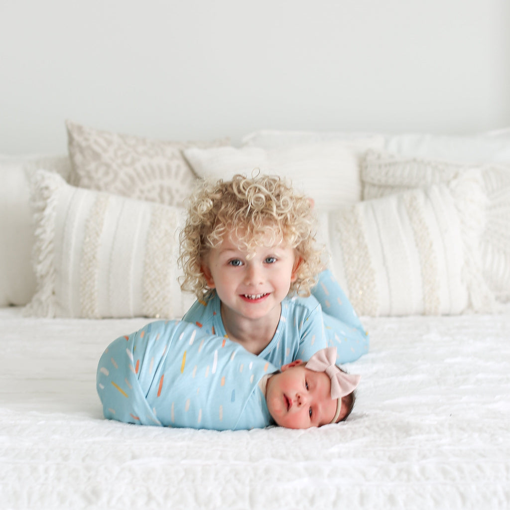 Posh-Peanut-Viscose-Bamboo-Stay-dry-fabric-reliably-chic-and-perfectly-practical-uniquely-designed-of-a-kind-teal raindrops baby swaddle boy