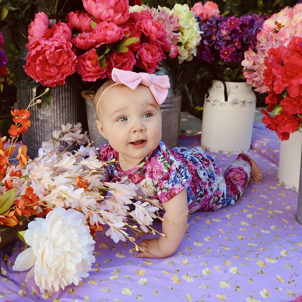 Baby wearing Bella Ruffled Cap Sleeve Romper