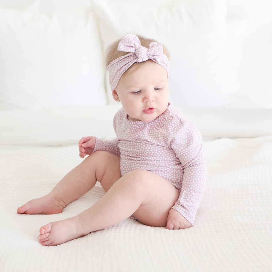 Pastel Orchid Polka Dot Long Sleeve Bodysuit