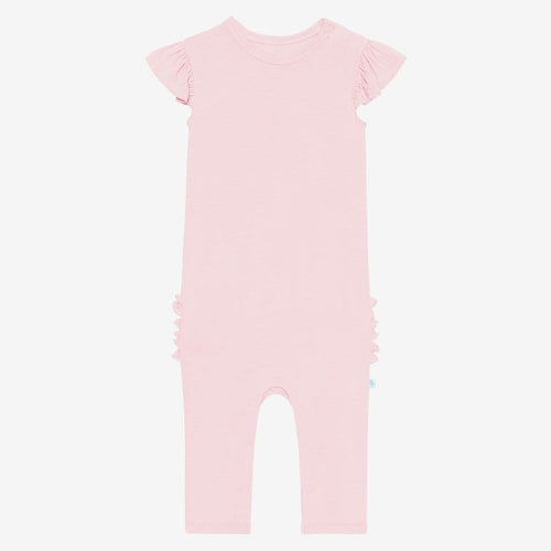 Front of blush ruffled cap sleeve romper