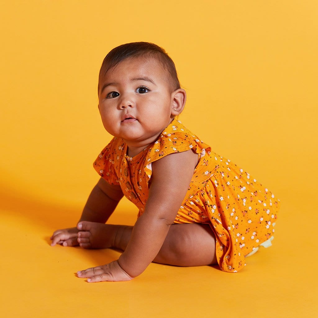 Baby on  Halsey Ruffled Cap Sleeve Henley Peplum Ruffled Bummie Set in floral print