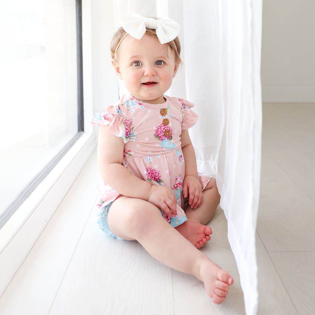 Baby in Jenny Ruffled Cap Sleeve Henley Peplum Ruffled Bummie Set