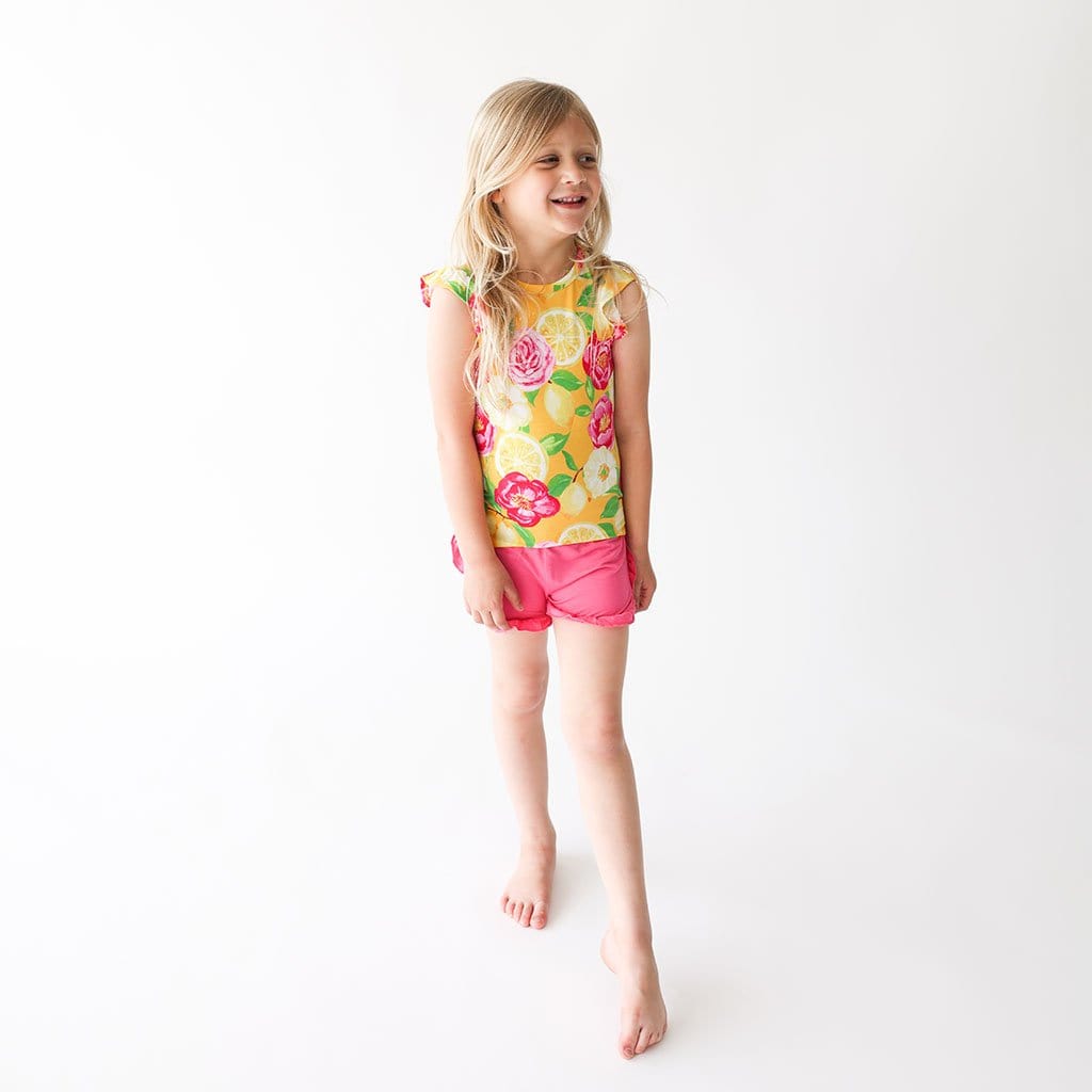 Toddler wearing Annika Ruffled Cap Sleeve Top Ruffled Short Set