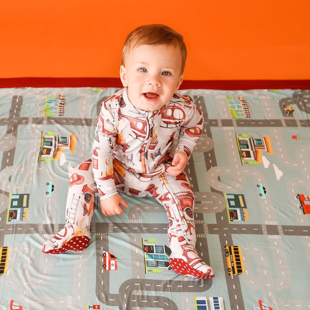 Baby sitting on Firemen & Posh City Luxe Patoo™