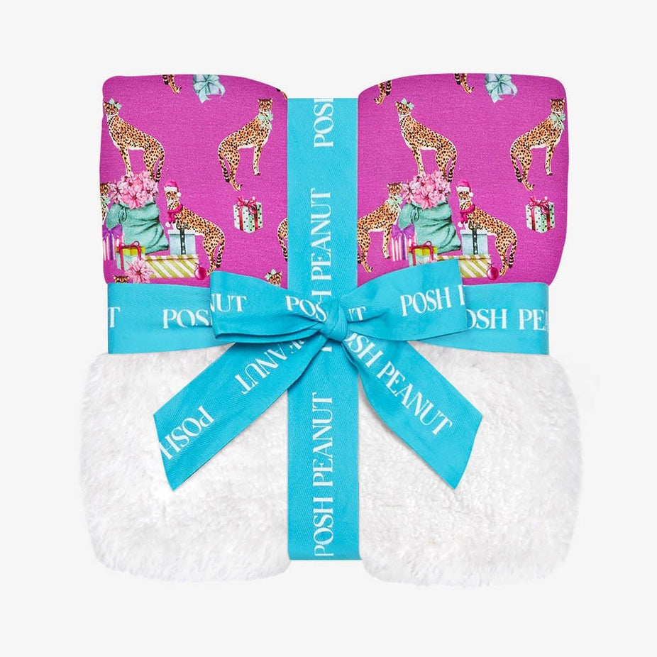 Folded and tied with a ribbon Plush Patoo™ Leopard Baby Blanket | Keana