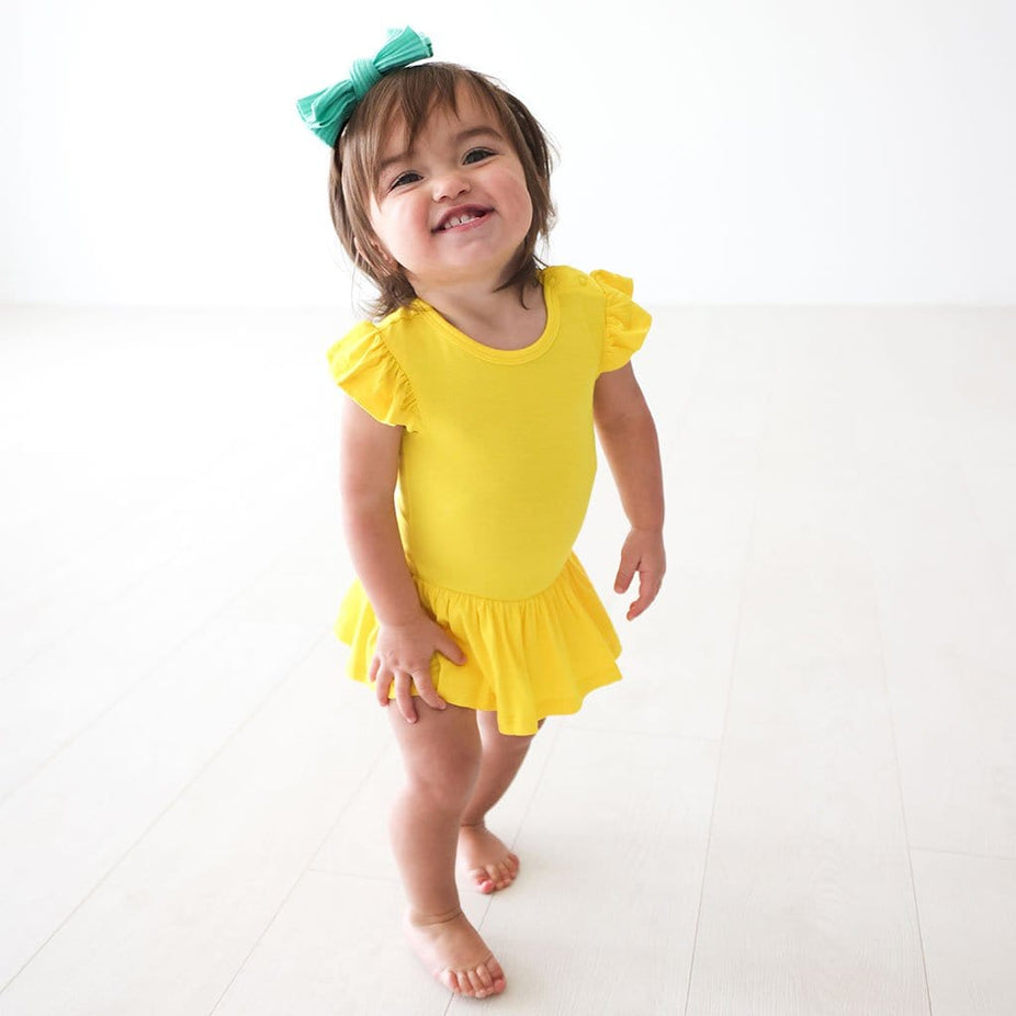 Baby girl in Electric Yellow Ruffled Cap Sleeve Twirl Skirt Bodysuit