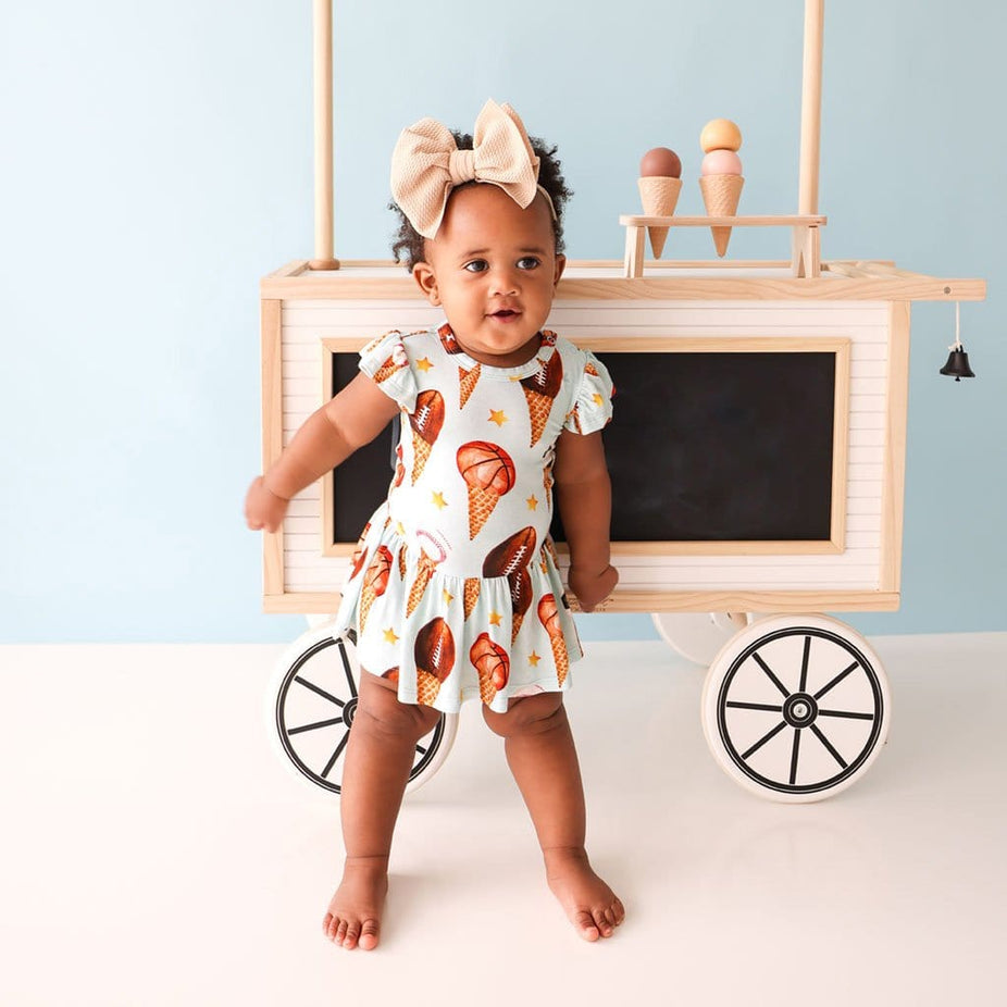 Baby wearing Scoops Ruffled Cap Sleeve Twirl Skirt Bodysuit