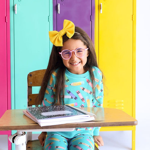 Toddler in yellow ribbon wearing Back to School Long Sleeve Sweatshirt