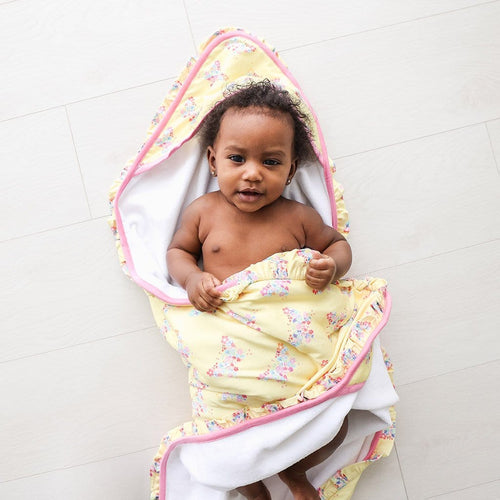 Baby wrapped in Keira Ruffled Hooded Towel