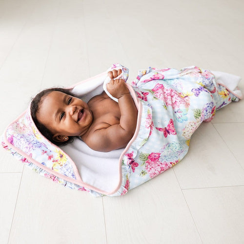 Baby  wrapped in Nicolette Ruffled Hooded Towel