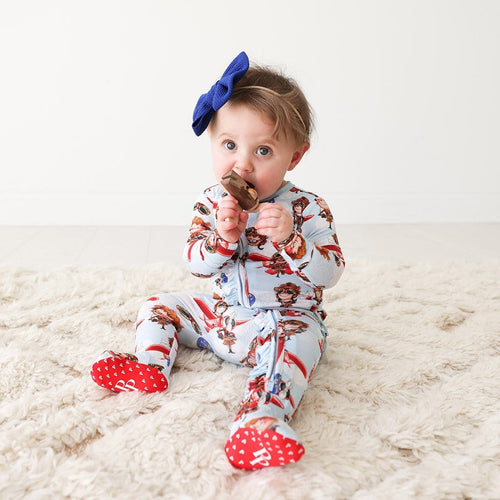 Baby wearing Amelia Earhart Footie Ruffled Zippered One Piece