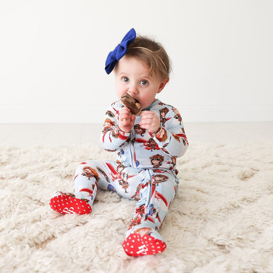 Baby wearing Amelia Earhart Footie Ruffled Zippered One Piece