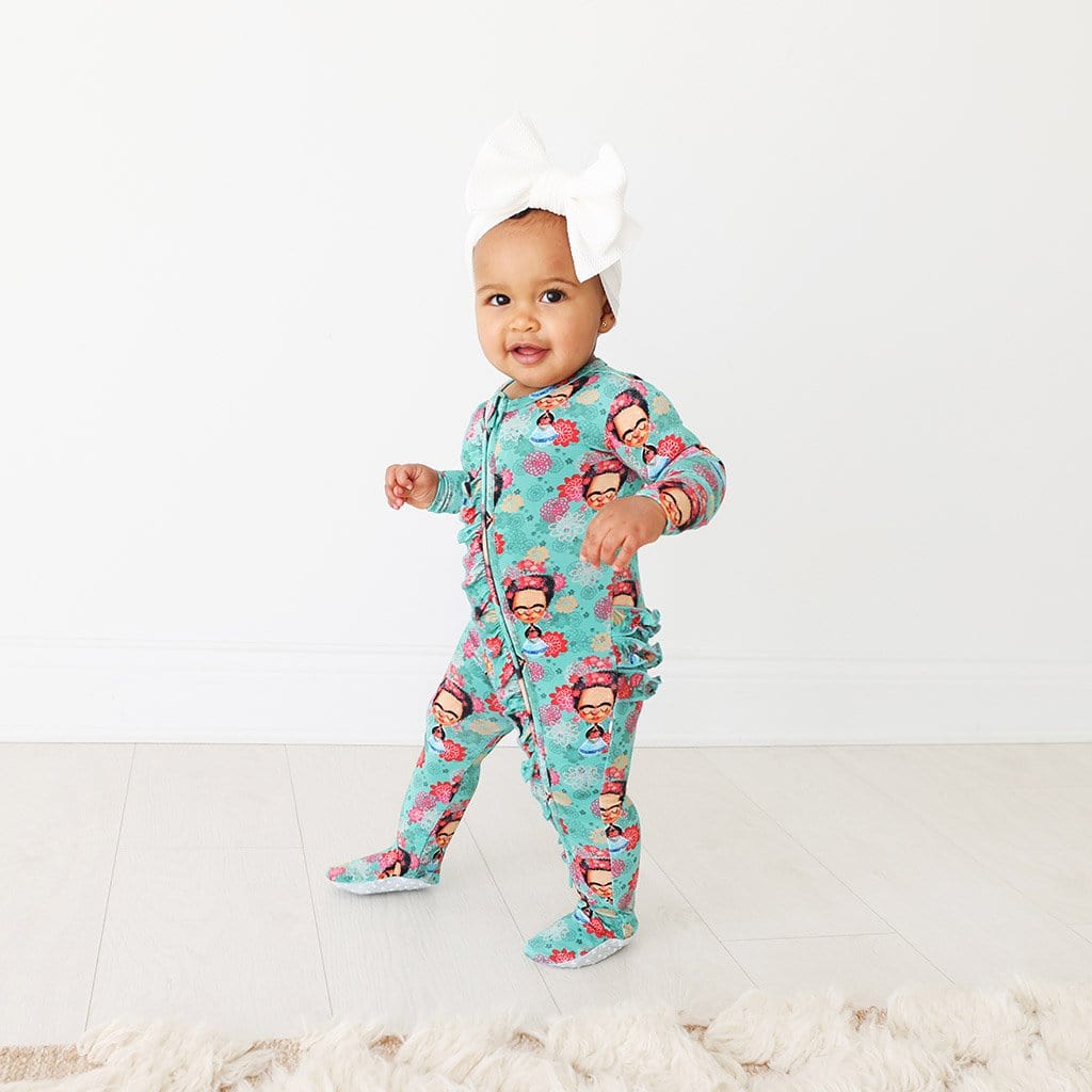 Baby on Frida Kahlo Footie Ruffled Zippered One Piece