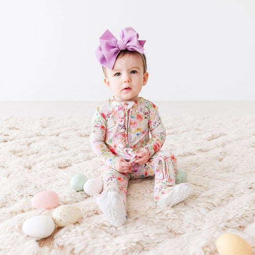 Baby wearing Rose Footie Ruffled Zippered One Piece