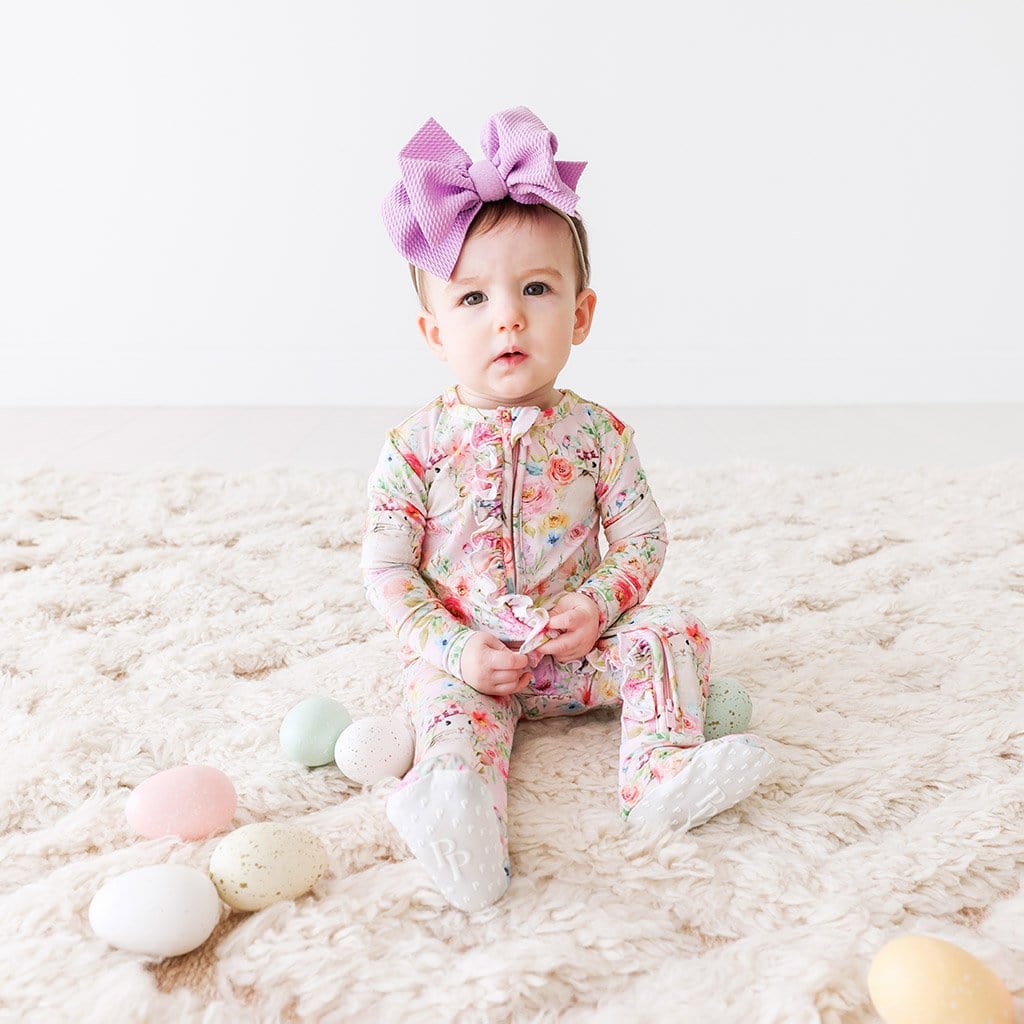Baby wearing Rose Footie Ruffled Zippered One Piece