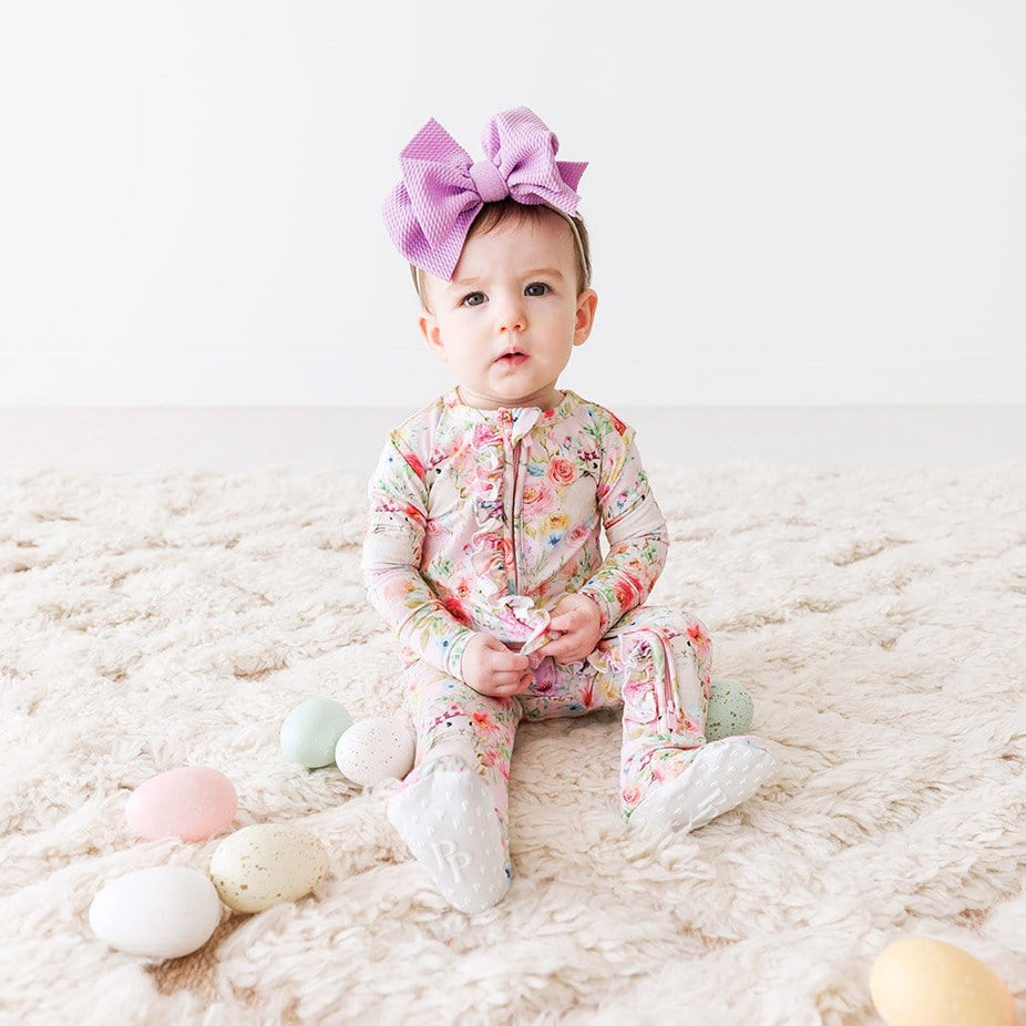 Baby wearing Rose Footie Ruffled Zippered One Piece