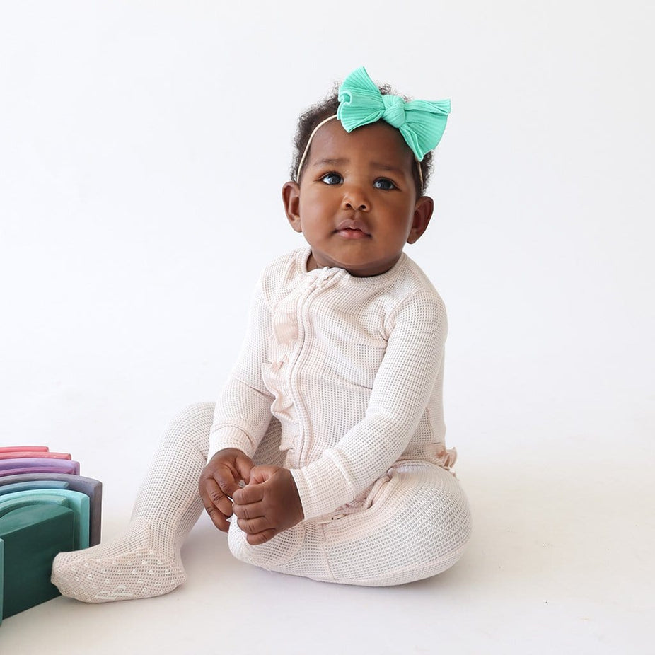 Sandy Blush Waffle Footie Ruffled Zippered One Piece