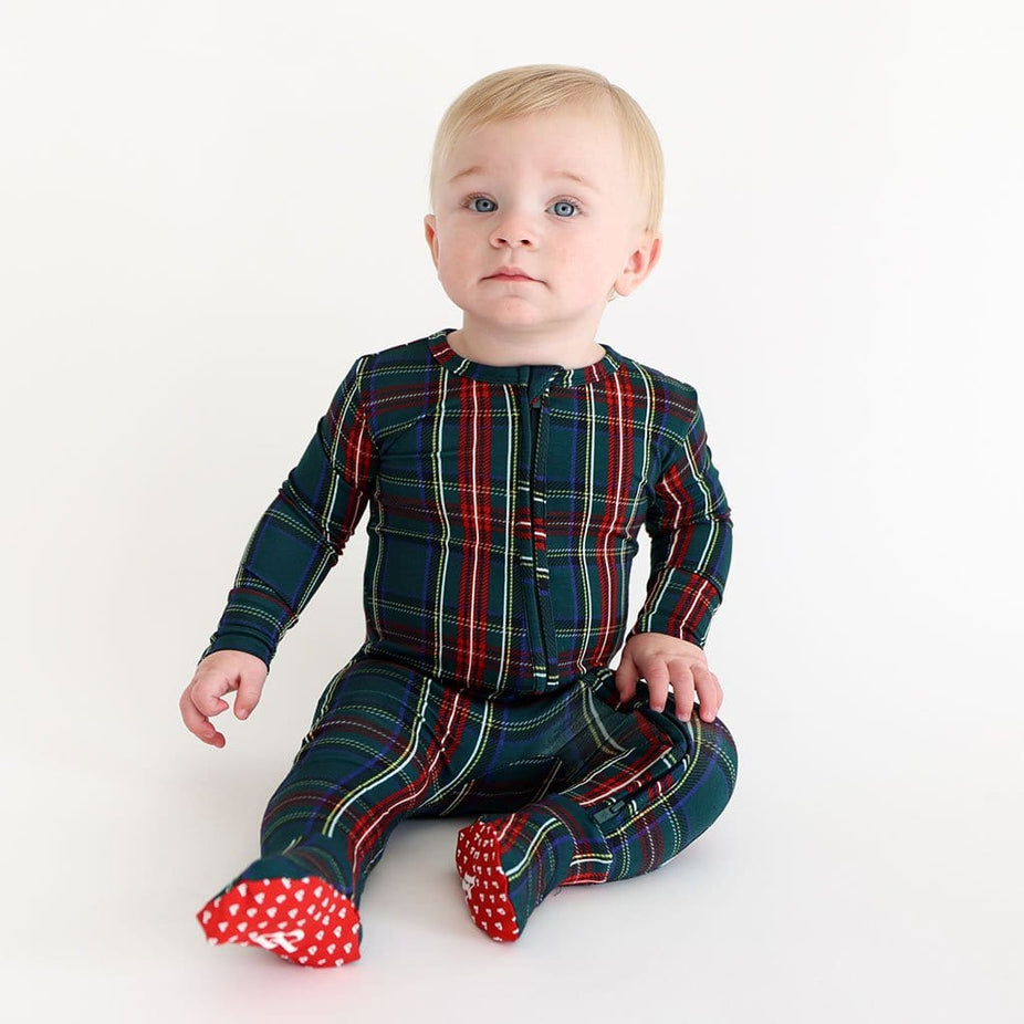 Baby boy in Tartan Plaid Baby Footed Pajamas by Posh Peanut