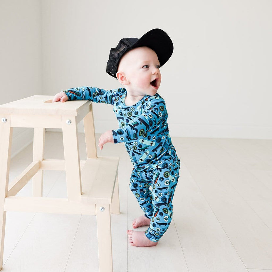 Baby wearing black cap on Cole Long Sleeve Pajamas