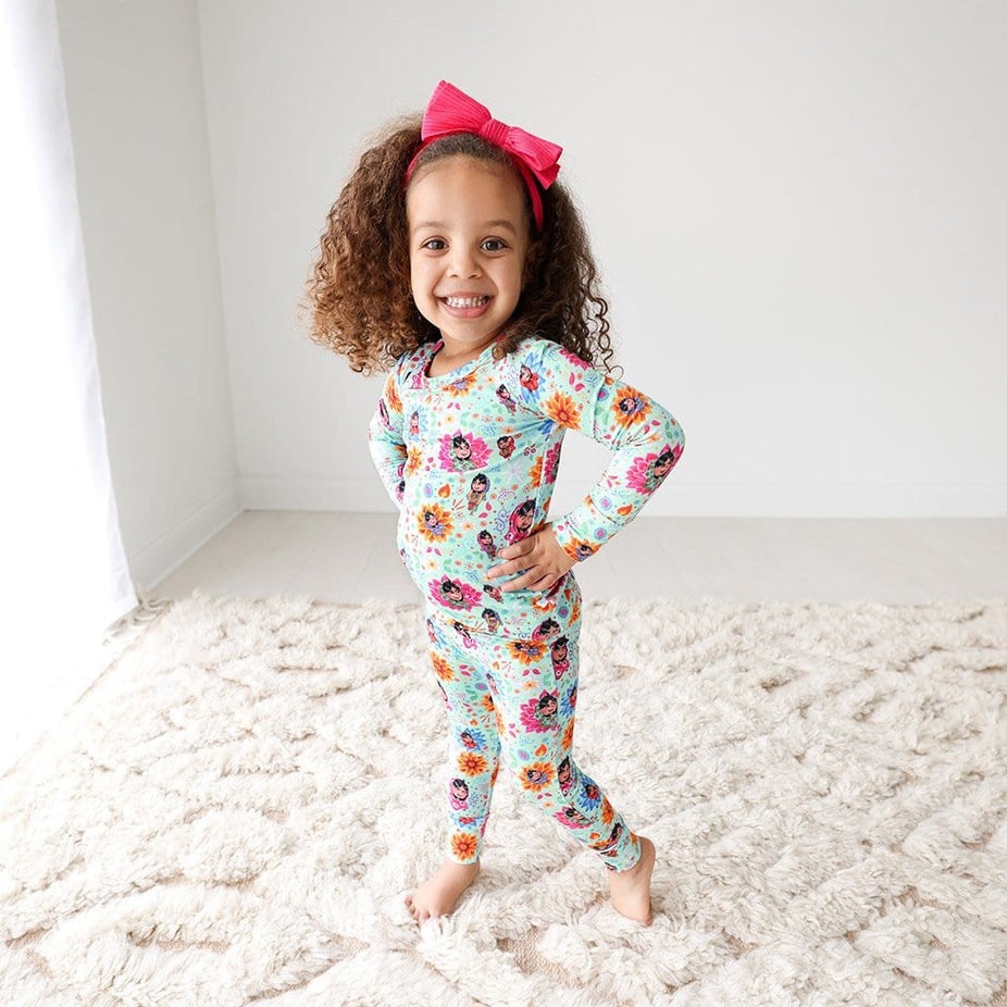 Toddler with ribbon wearing Malala Yousafzai Long Sleeve Pajamas