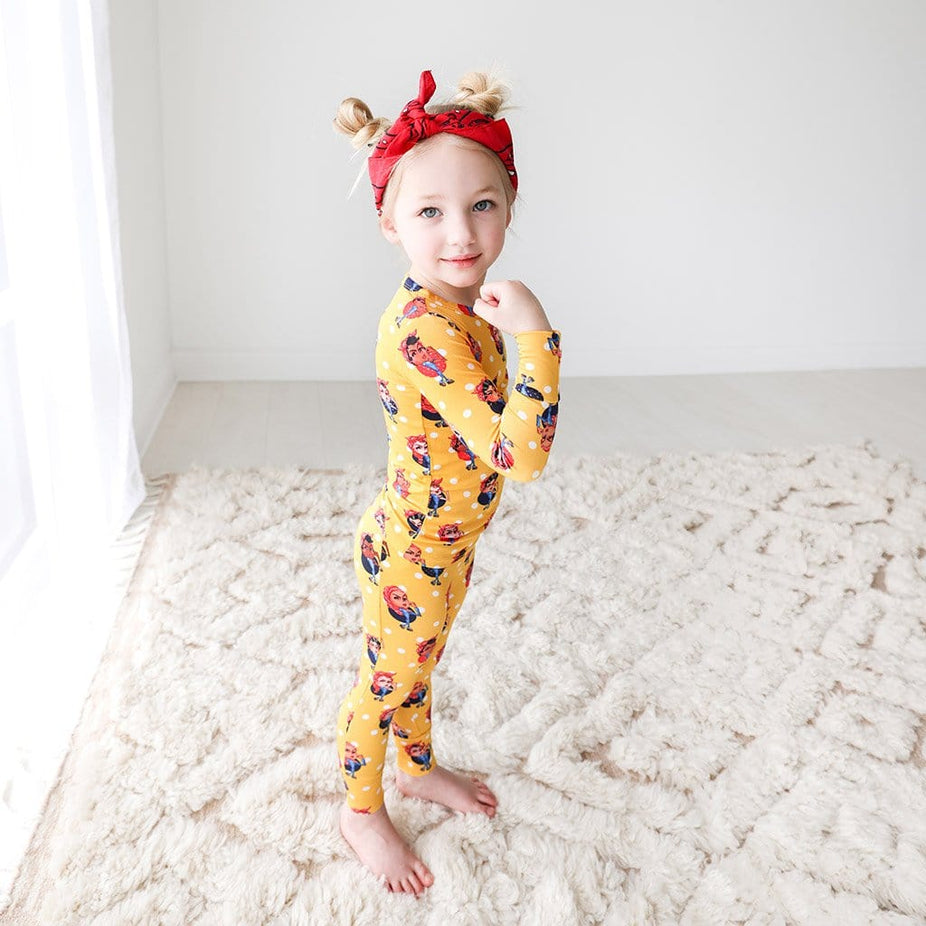 Toddler wearing Rosie the Riveters Long Sleeve Pajamas