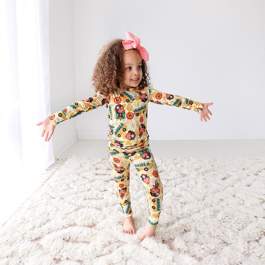 Toddler with ribbon wearing Rosa Parks Long Sleeve Pajamas