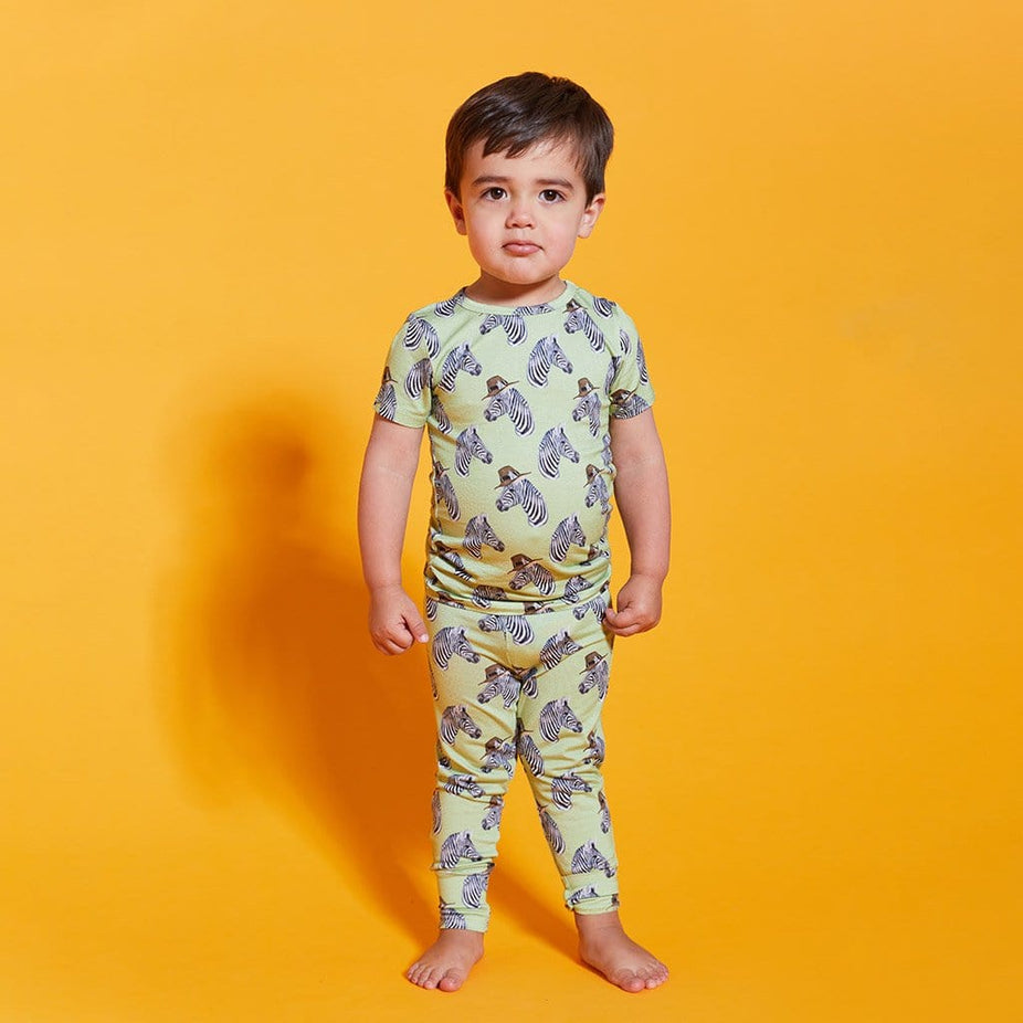 Boy toddler wearing Dante Short Sleeve Pajamas in Zebra Print