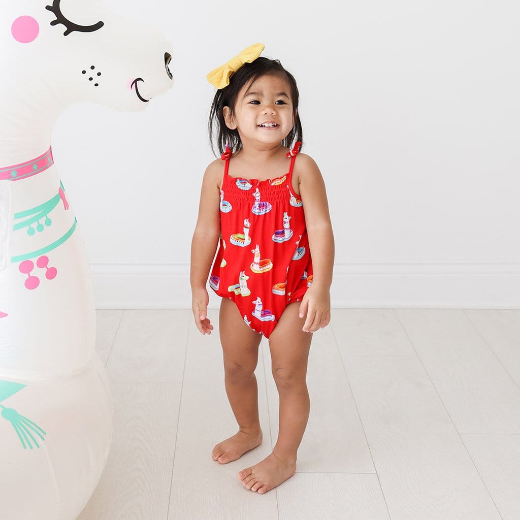 Baby girl wearing Emilio Sleeveless Bubble Romper