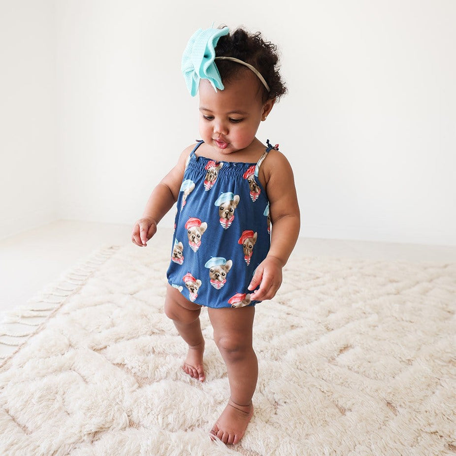 Baby wearing Blue Dog Print Frenchie Sleeveless Bubble Romper