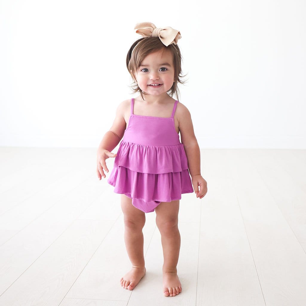 Toddler wearing Royal Violet Sleeveless Ruffled Bubble Romper