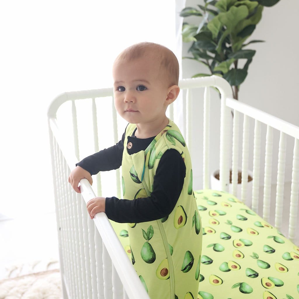 Baby in crib wearing Franco Sleeveless Sleep Bag 1.0 Tog