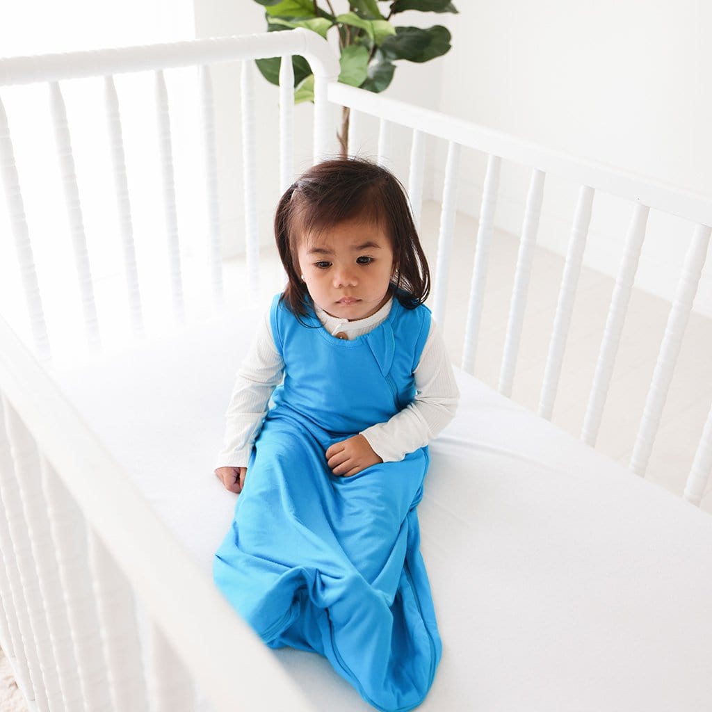 Baby girl wearing Hawaiian Blue Sleeveless Sleep Bag 2.5 Tog