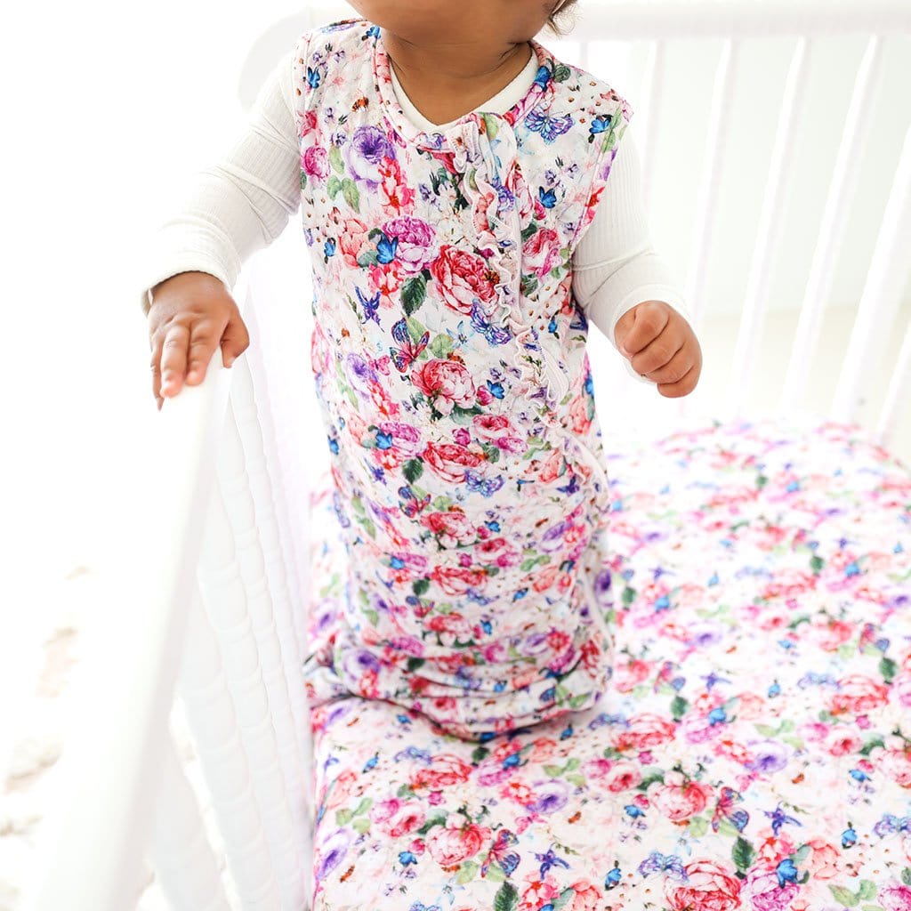Baby wearing Vivienne Sleeveless Ruffled Sleep Bag 1.0 Tog