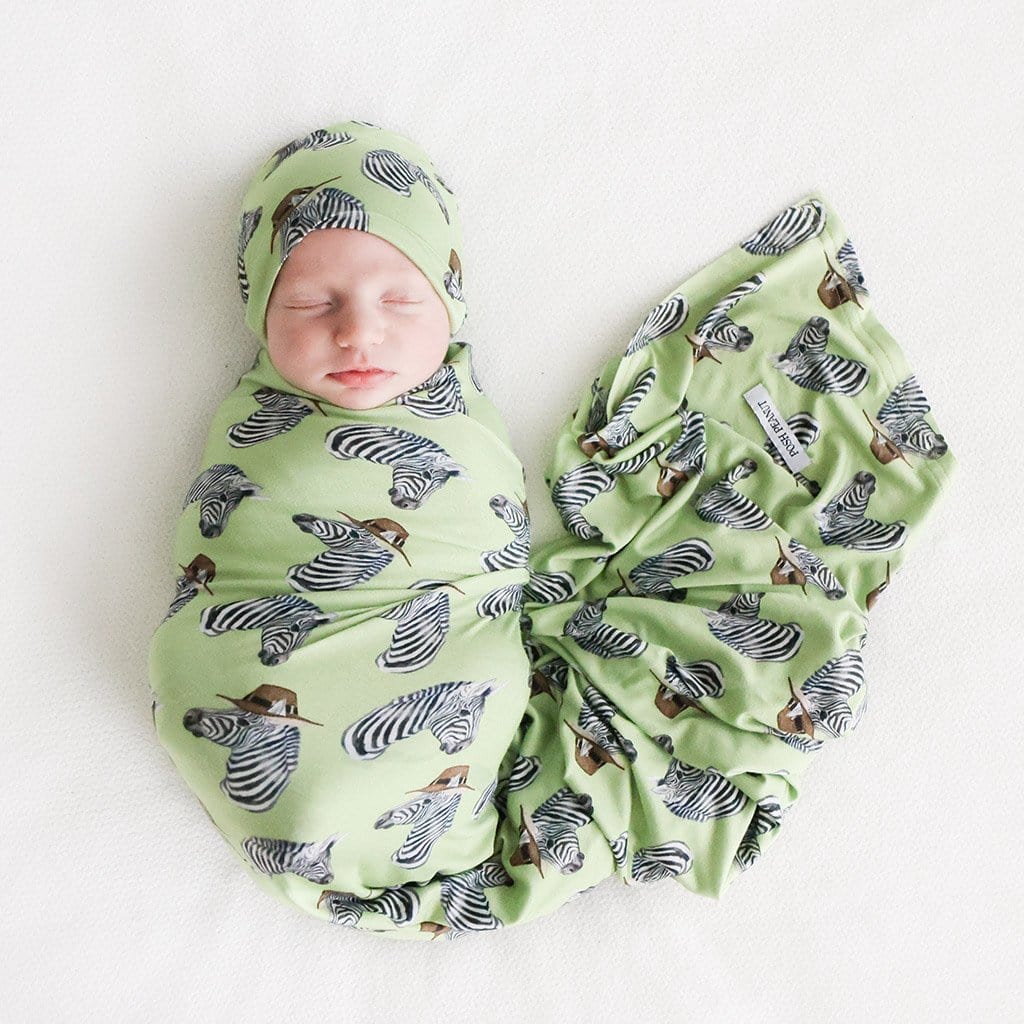Baby wearing Dante Swaddle Beanie Set