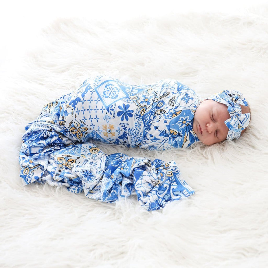 Baby wearing Paola Swaddle Headband Set