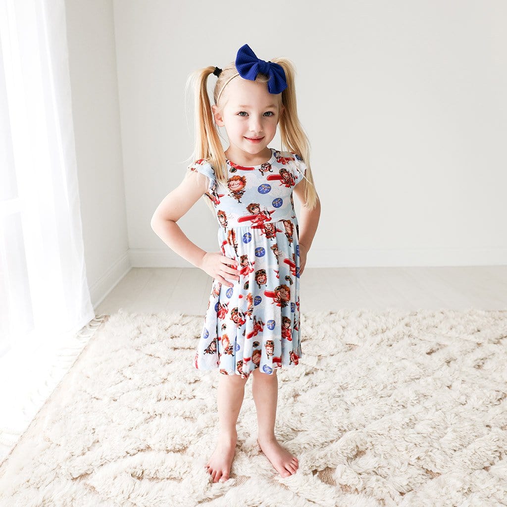 Toddler wearing Amelia Earhart Ruffled Cap Sleeve Twirl Dress
