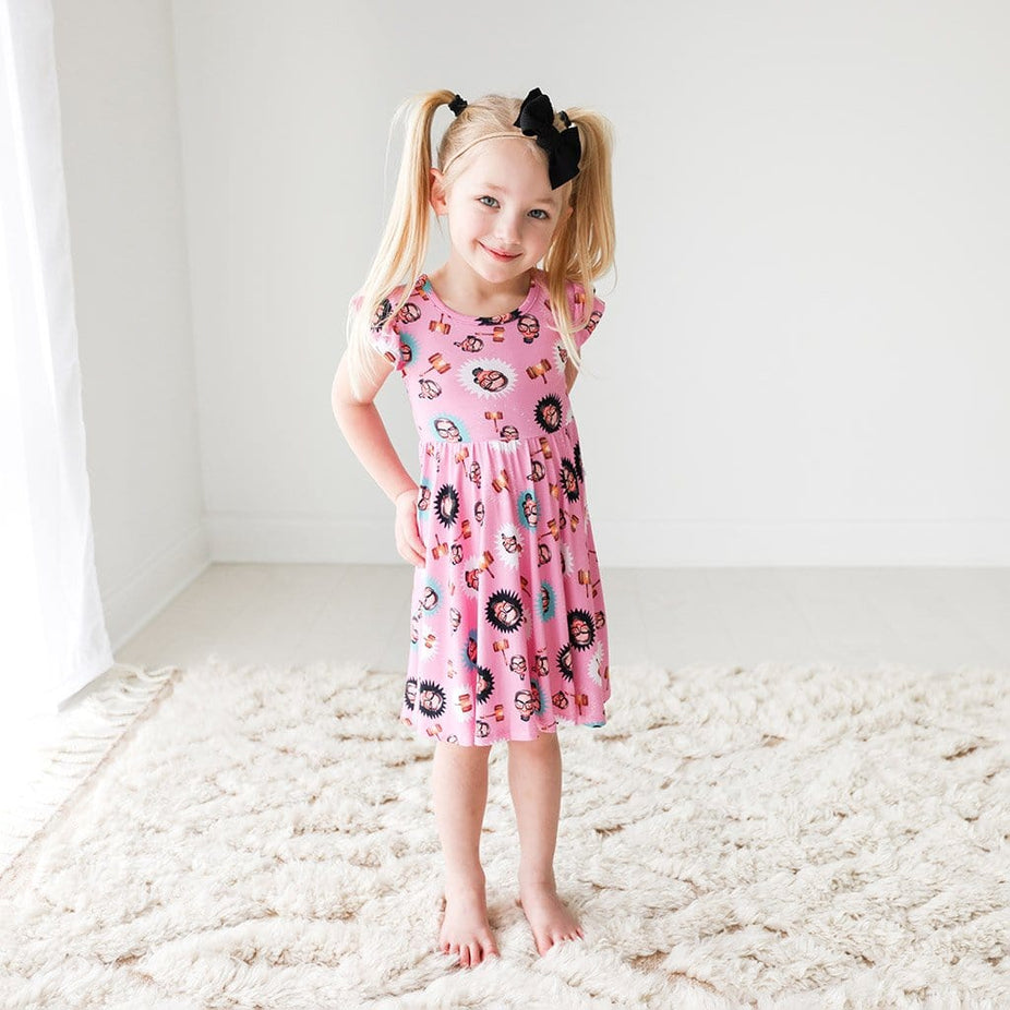 Toddler wearing Ruth Bader Ginsburg Ruffled Cap Sleeve Twirl Dress
