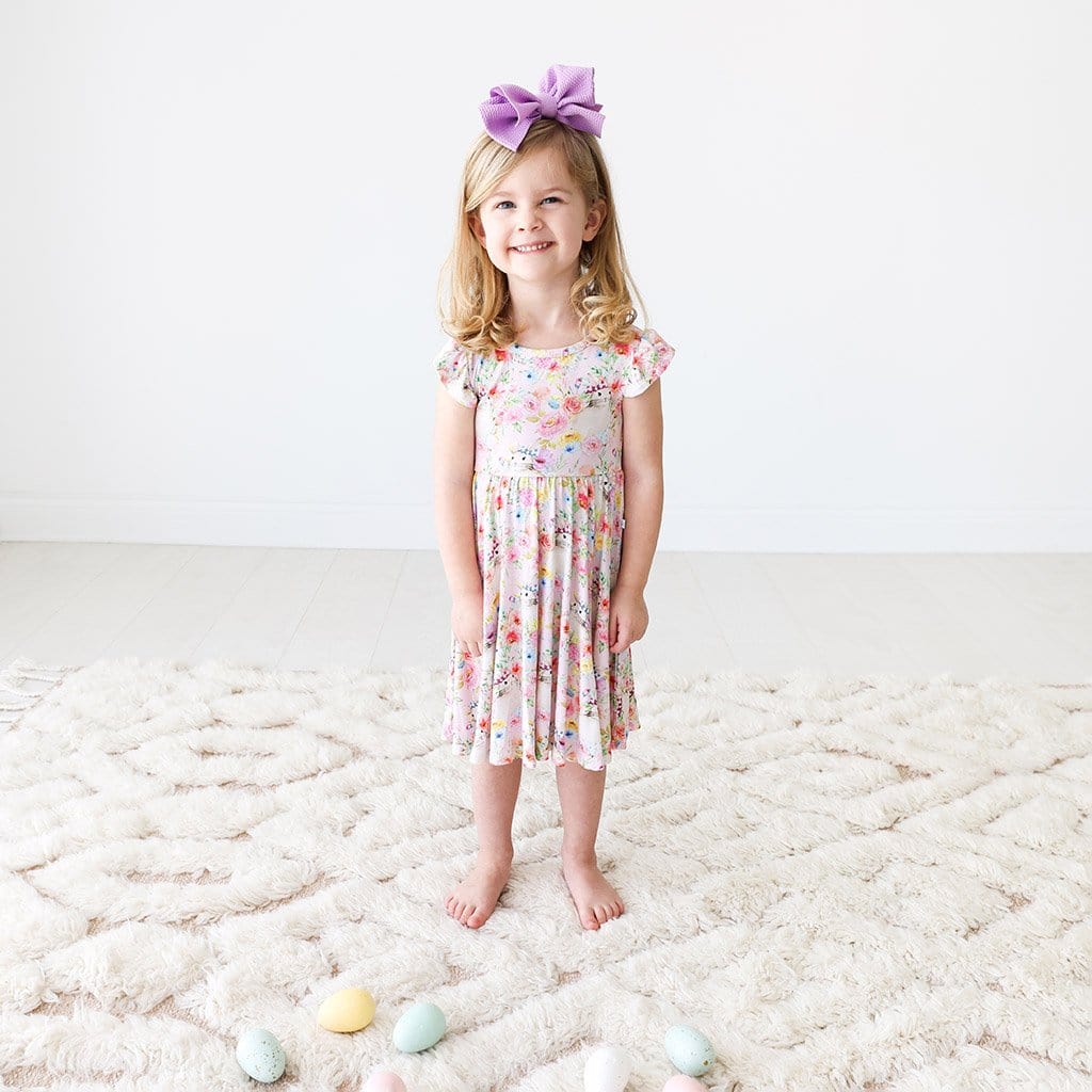 Toddler wearing Rose Ruffled Cap Sleeve Twirl Dress