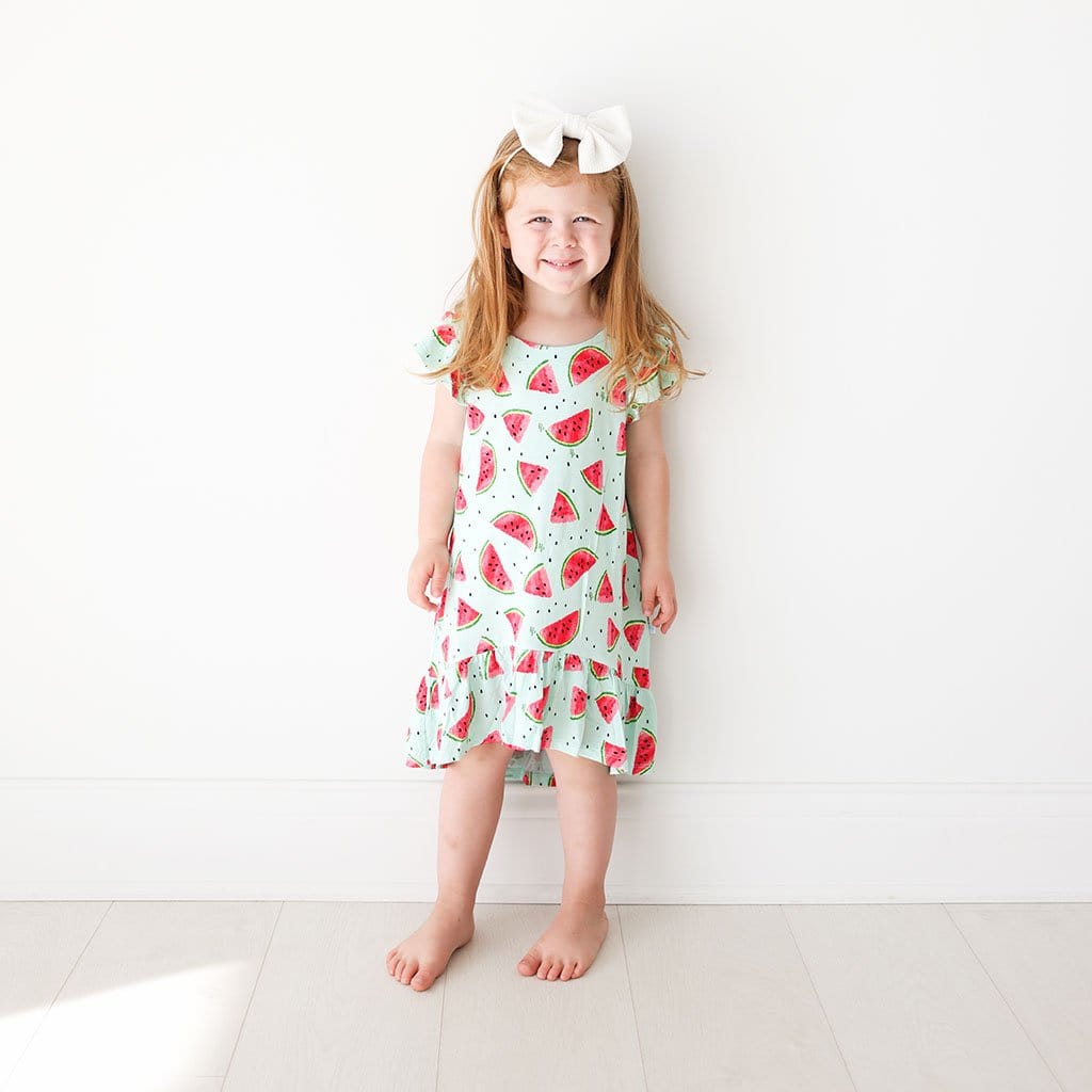 Toddler wearing Mellony Ruffled Cap Sleeve Hi-Low Dress in watermelon print