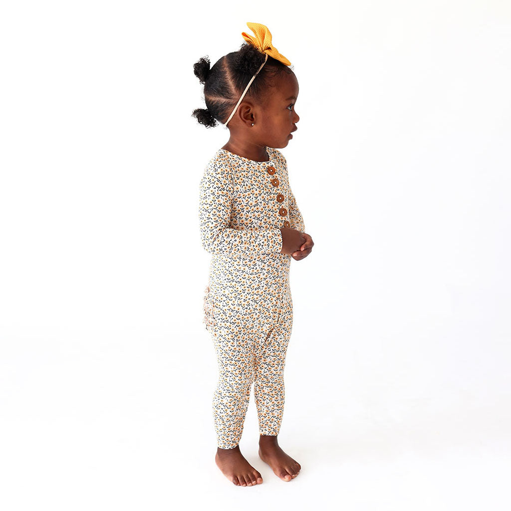 Magnolia Long Sleeve Ruffled Henley Romper