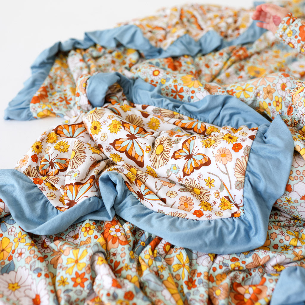 Ruth & Areni Ruffled Luxe Patoo® Blanket