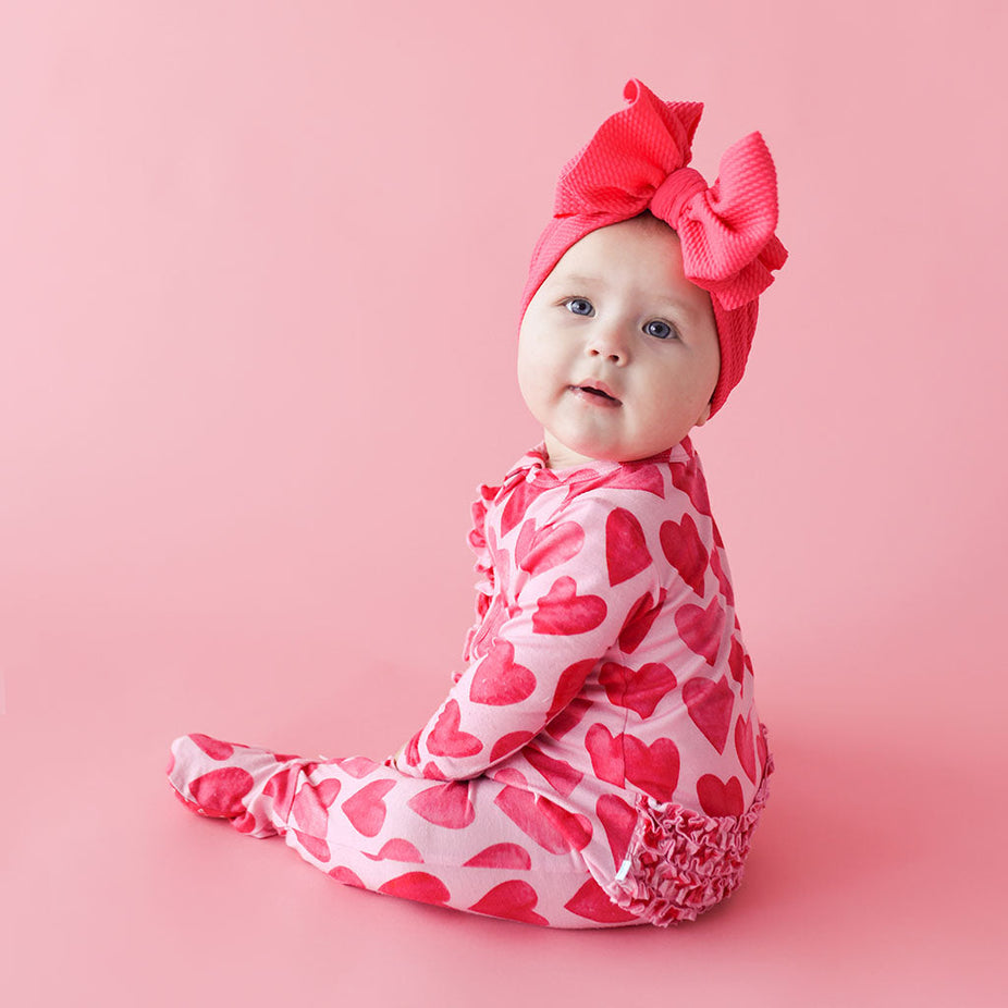 Queen of Posh Footie Ruffled Zippered One Piece