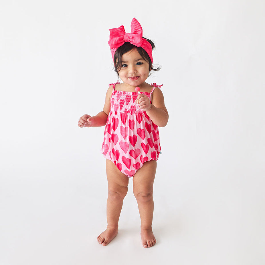 Queen of Posh Smocked Bubble Romper